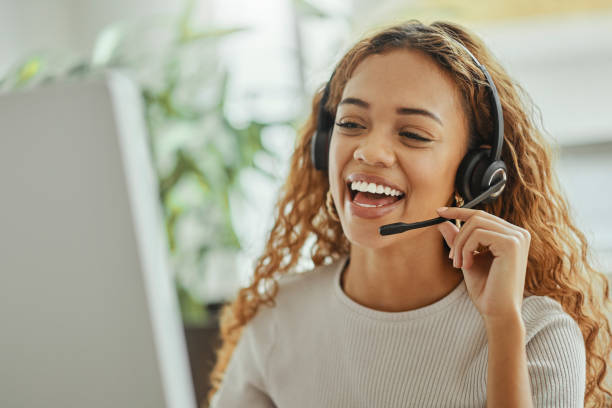 Customer service, happy and communication of woman at call center pc talking with joyful smile. Consultant, advice and help desk girl speaking with clients online with computer headset mic. Customer service, happy and communication of woman at call center pc talking with joyful smile. Consultant, advice and help desk girl speaking with clients online with computer headset mic. customer support stock pictures, royalty-free photos & images