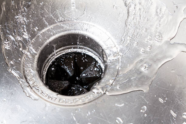 Kitchen sink Stainless steal kitchen sink with water drops drain cleaning stock pictures, royalty-free photos & images