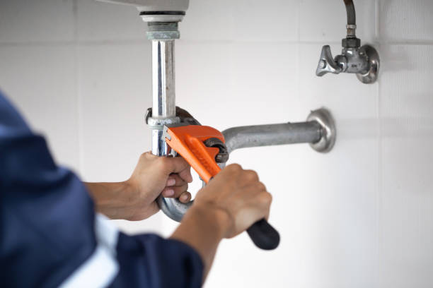 plumber at work in a bathroom, plumbing repair service, assemble and install concept. plumber at work in a bathroom, plumbing repair service, assemble and install concept. plumbing stock pictures, royalty-free photos & images