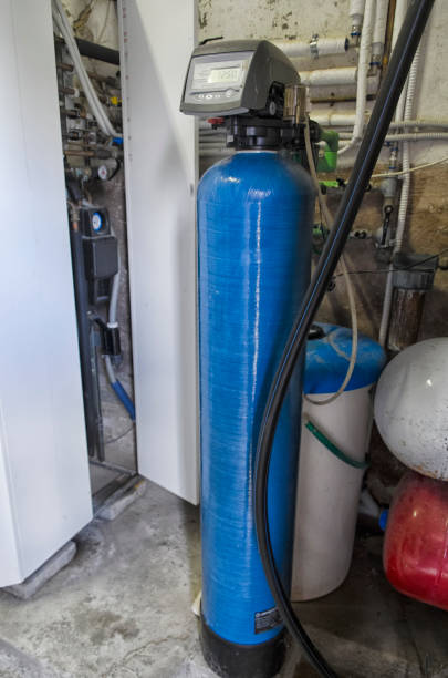 Water conditioner and condensing boiler View of water conditioner and condensing boiler water softeners stock pictures, royalty-free photos & images